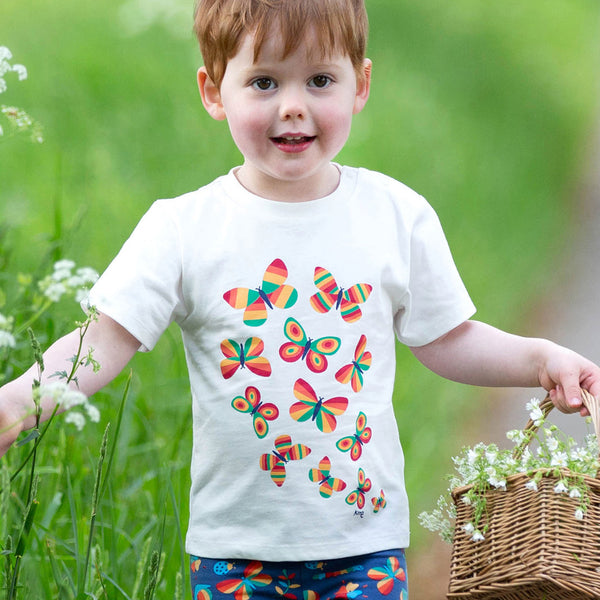 Boy wearing Kite clothing organic Butterflies t-shirt