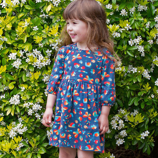 Girl wearing Kite Clothing organic Garden treasure dress