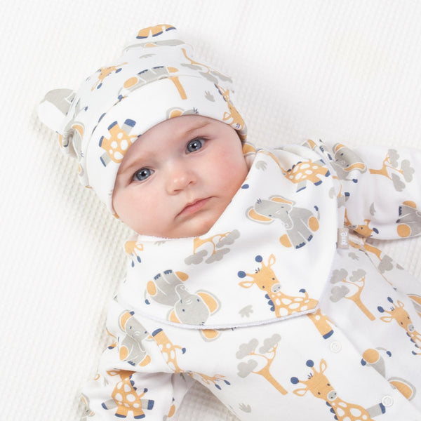 Baby wearing Kite giraffe and ele hat