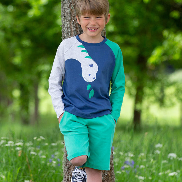 Boy wearing Kite Clothing organic Corfe shorts- green