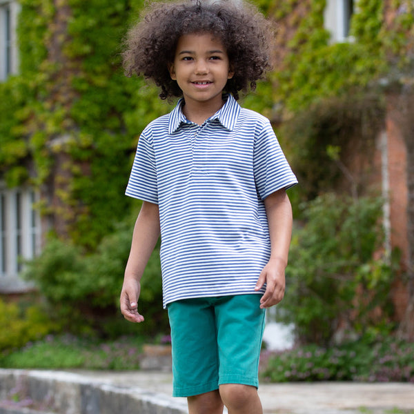 Boy wearing Kite Clothing organic Yacht shorts- green