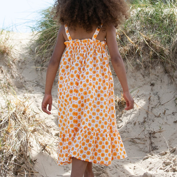 Girl wearing Kite Clothing organic Groovy dot sundress