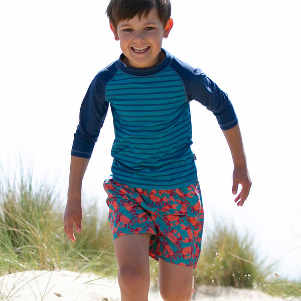 Boy wearing Kite Clothing Happy crab swim shorts