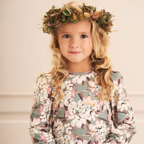 Girl wearing Musli organic Hydrangeas print dress