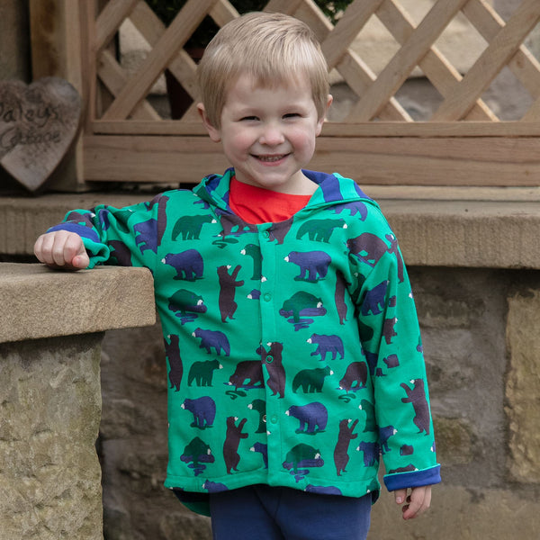 Boy wearing Piccalilly organic Reversible jacket- mountain bear