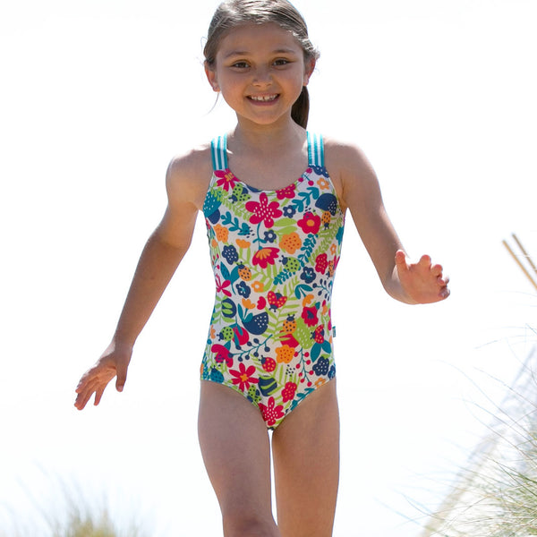 Girl wearing Kite Clothing ladybug swimsuit