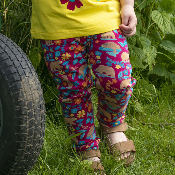 Girl wearing Piccalilly organic Leggings- honey bear