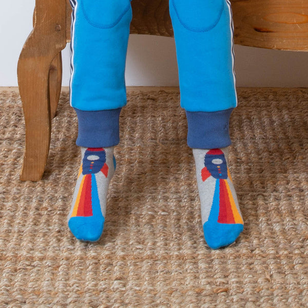 Boy wearing Kite Clothing organic Moon mission socks
