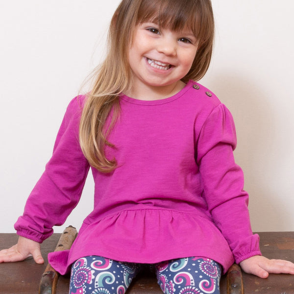 Girl wearing Kite organic Easy breezy tunic- orchid
