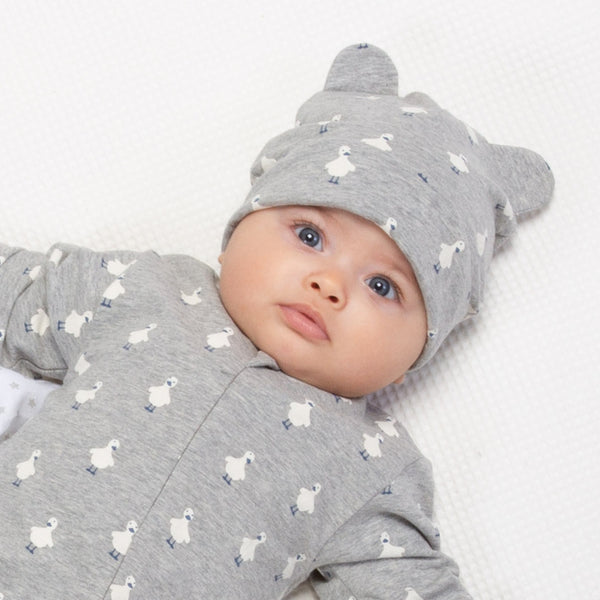 Baby wearing Kite polka duck hat