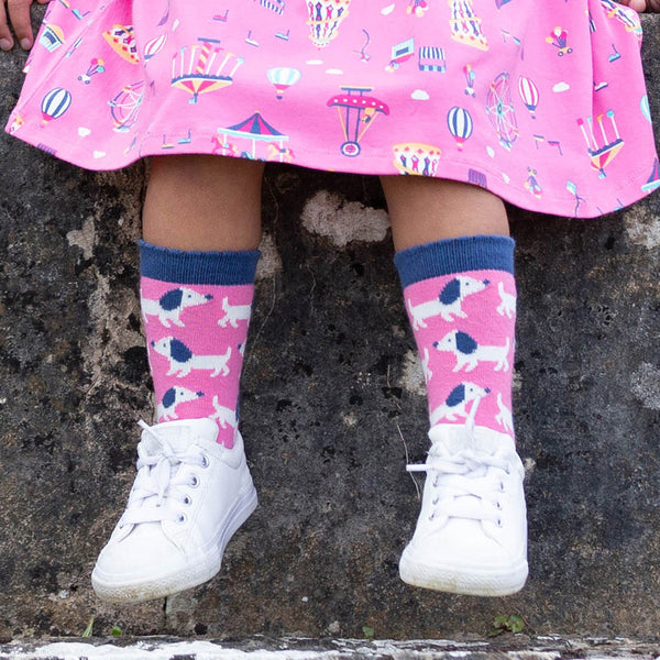 Girl wearing Kite Clothing organic Puppy pals socks