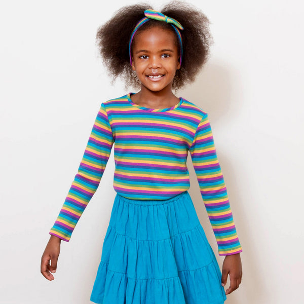 Girl wearing Kite Clothing organic Rainbow top