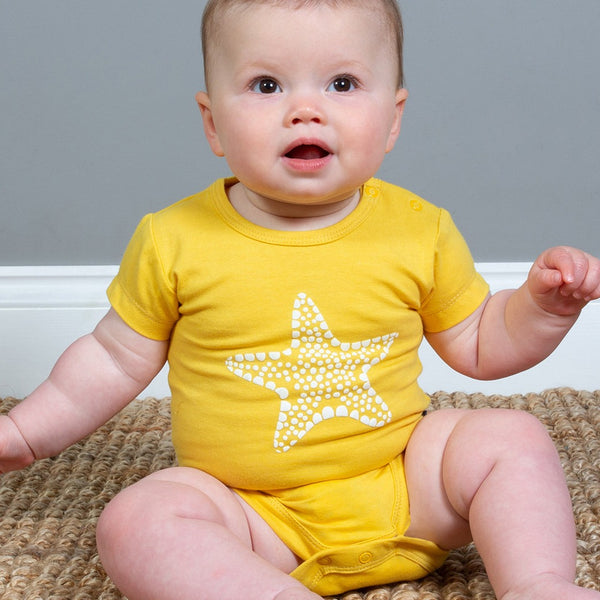 Baby wearing Kite Clothing Sea star bodysuit