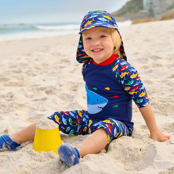 Boy wearing JoJo Maman Bebe Shark 2-piece sun suit