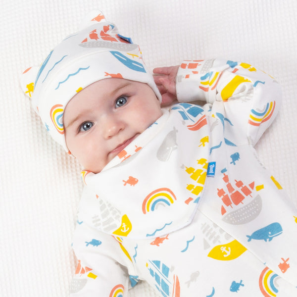 Baby wearing Kite ship ahoy bib