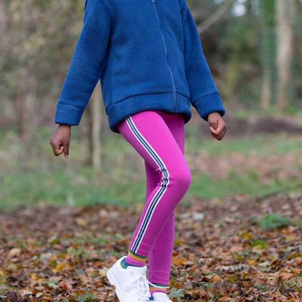 Girl wearing Kite Clothing organic Side stripe leggings