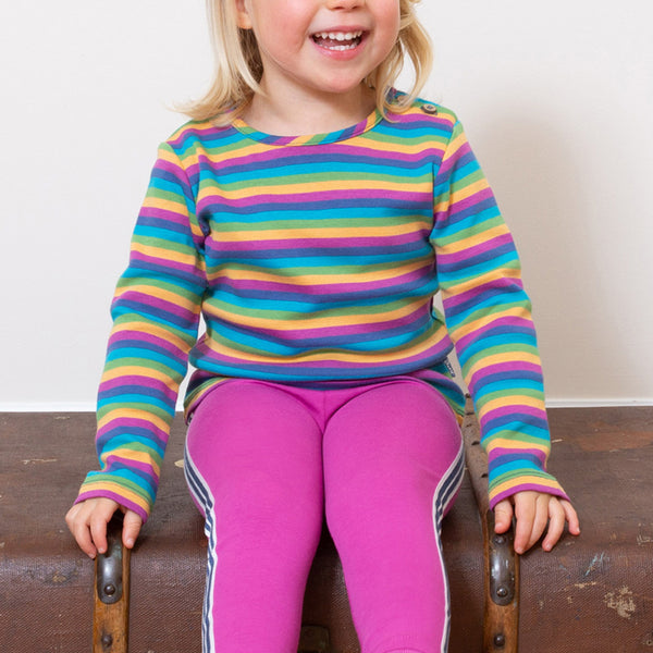 Girl wearing Kite Clothing organic Side stripe leggings