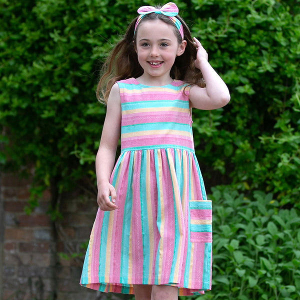 Girl wearing Kite Clothing organic Multicolor stripe dress