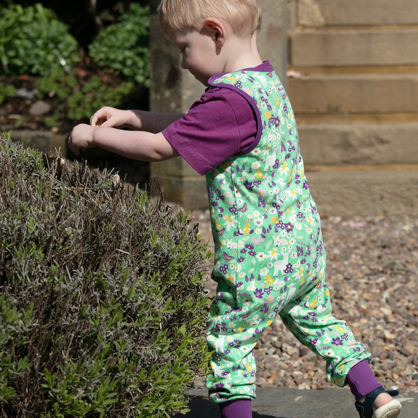 Boy wearing Piccalilly Dungarees- spring meadow