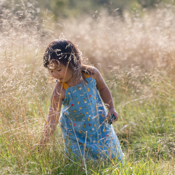 Girl wearing Little Green Radicals Summer Days Sundress