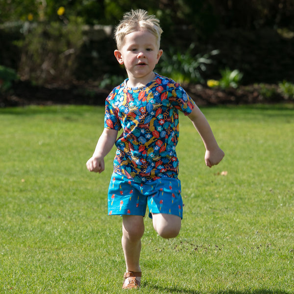 Boy wearing Piccalilly organic All over print t-shirt- tropic