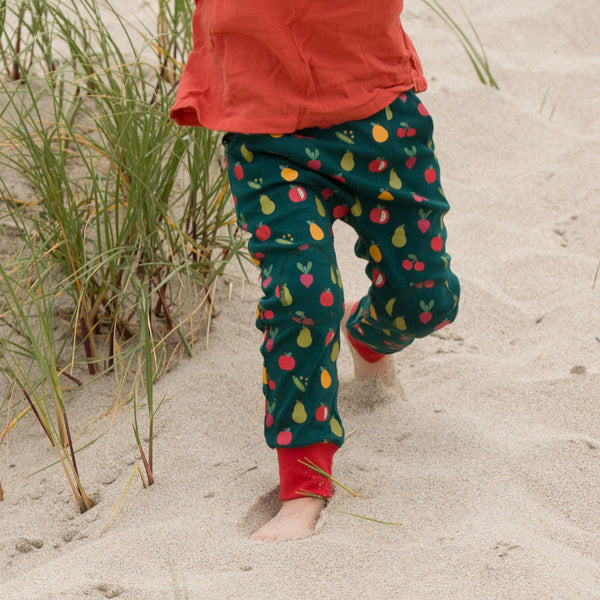 Boy wearing Little Green Radicals organic Vegetable patch joggers
