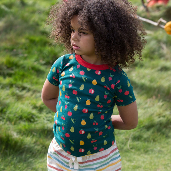 Girl wearing Little Green Radicals organic Vegetable patch short sleeve t-shirt
